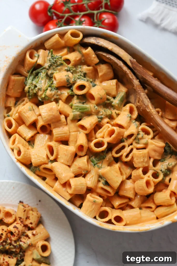 26 Cozy Vegan Dinners to Warm Your Winter Nights 9 white baking dish with vegan creamy roasted tomato pasta made with silken tofu.
