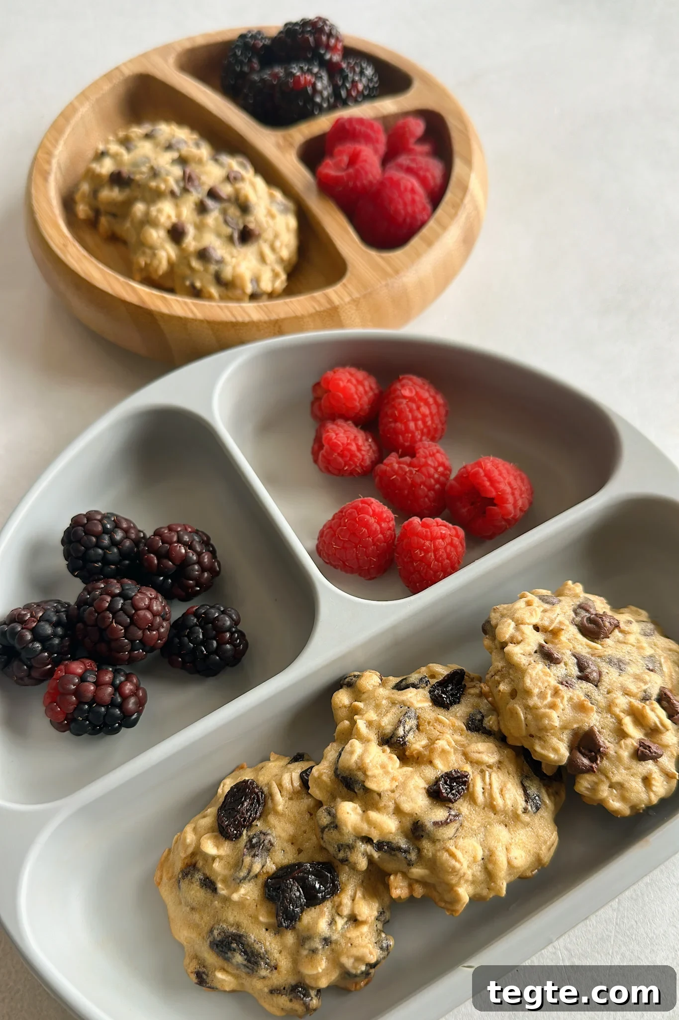 Chewy Maple Oatmeal Cookies with Warm Spices 4 Maple oatmeal cookies served with berries.