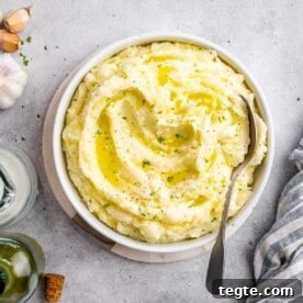 Over 20 St. Patrick’s Day Recipes for Festive Celebrations 12 A small round bowl filled with mashed potatoes.