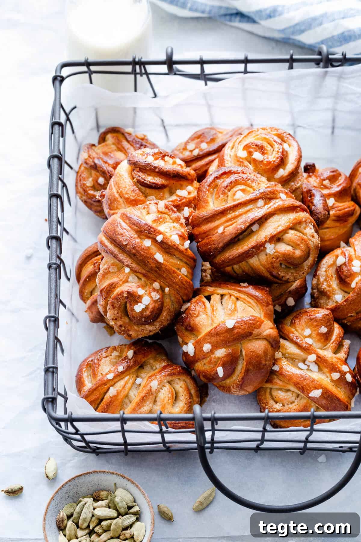Authentic Swedish Cardamom Buns (Kardemummabullar) Recipe 19 side close up of cardamom buns in a wired basket