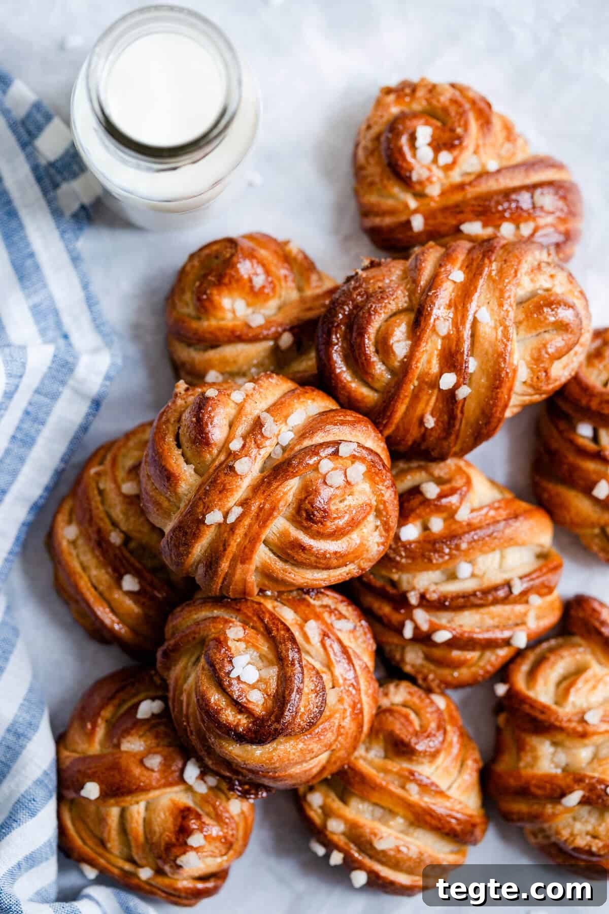 Authentic Swedish Cardamom Buns (Kardemummabullar) Recipe 6 close up of cardamom buns topped with sugar pearls
