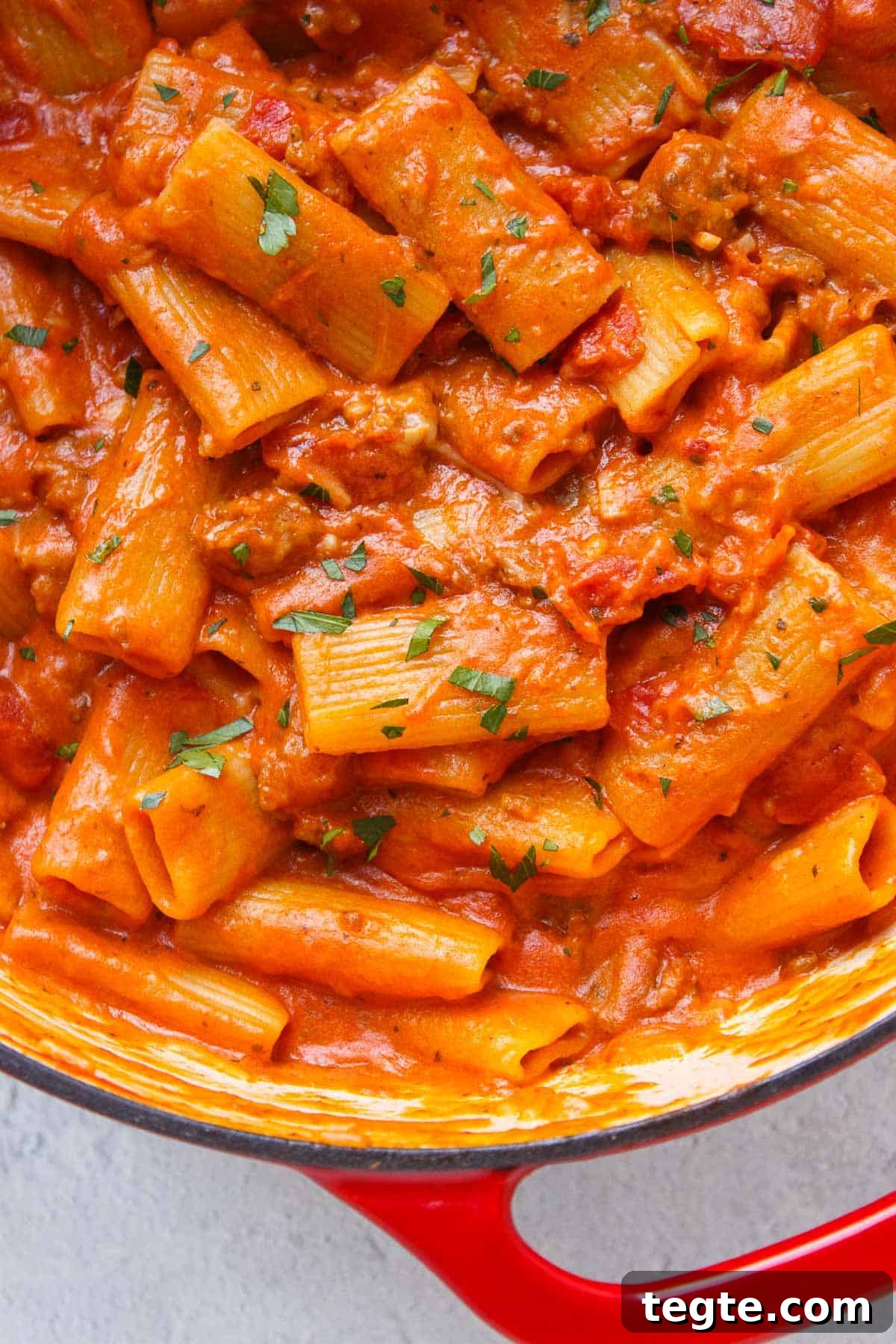 Creamy One Pot Rigatoni garnished with fresh basil