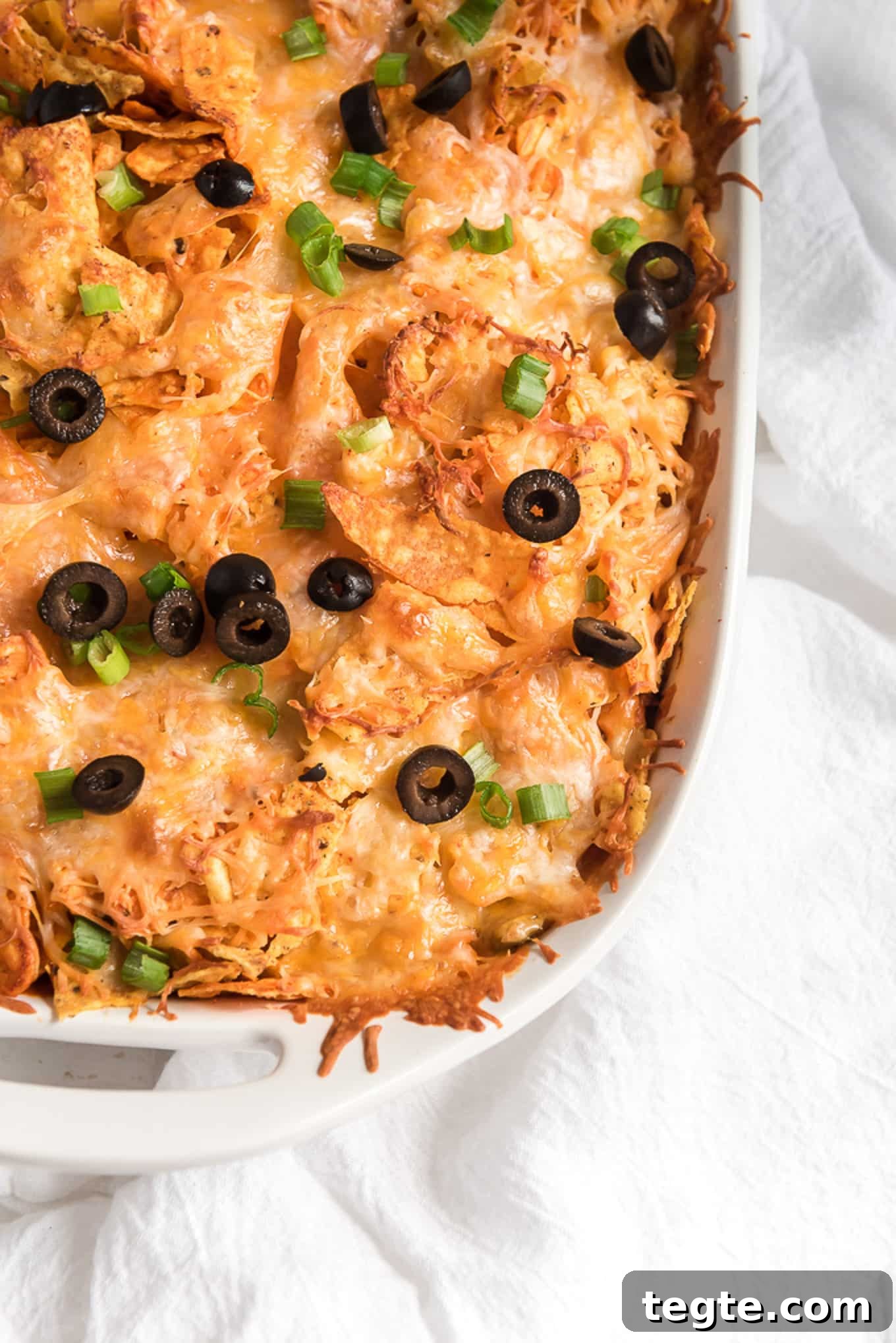Doritos Taco Casserole: Cheesy Tex-Mex Bake Everyone Loves 7 Baked taco casserole made with Doritos.