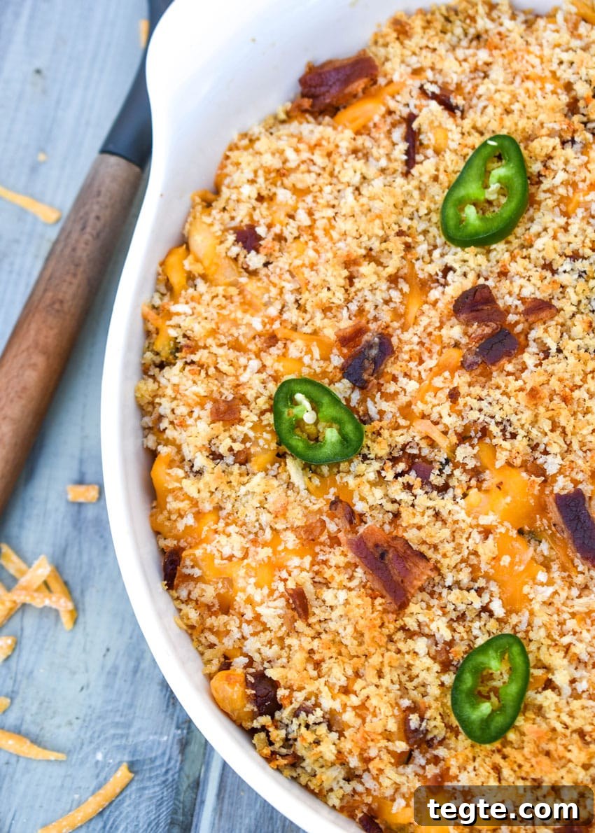 jalapeno popper mac and cheese in a large white serving bowl