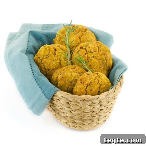 Vegan Pumpkin Drop Biscuits in a Basket with blue napkin