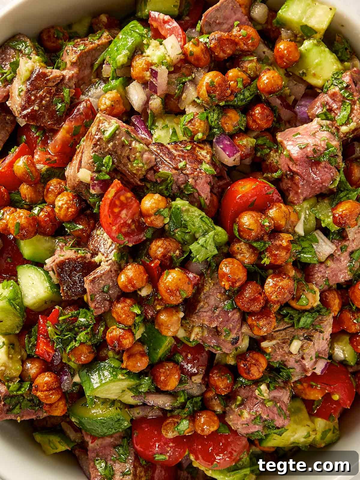 Close view of Steak and chickpea salad with chimichurri