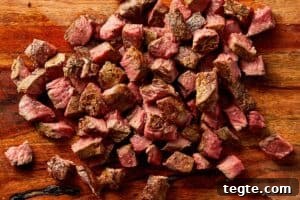 medium rare steak cut into bite size cubes for steak salad
