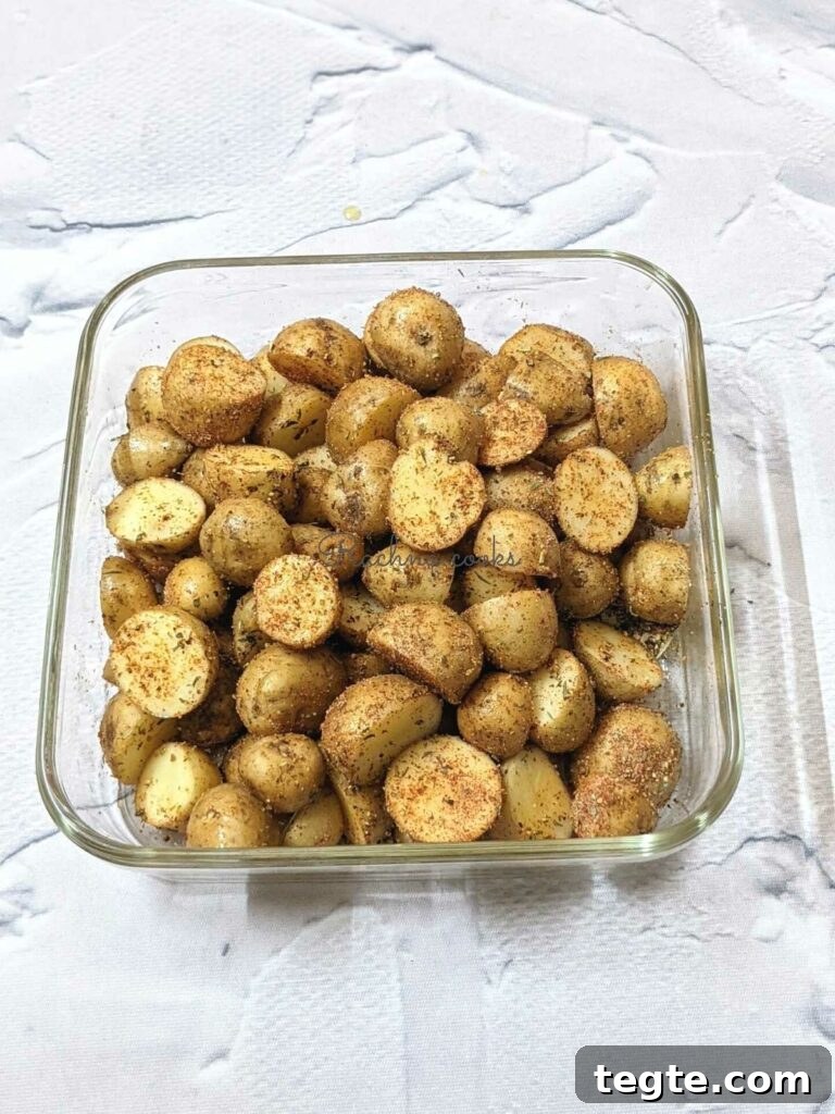 Baby potato halves coated with spices.