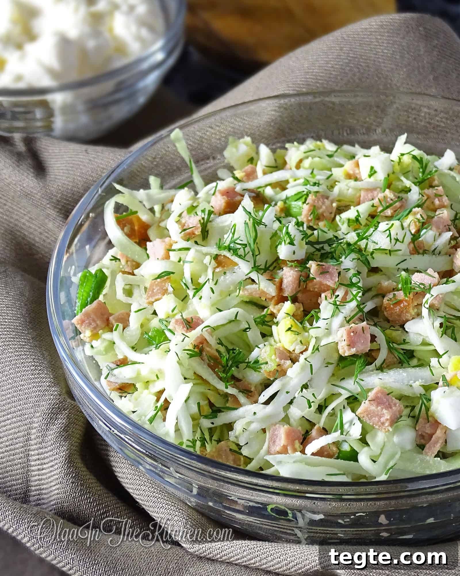 Crispy Cabbage and Egg Salad with Tangy Dressing 2 Cabbage Egg Salad: rich salad combo of green cabbage, sausage, eggs and greens dressed into mayo. | olgainthekitchen.com