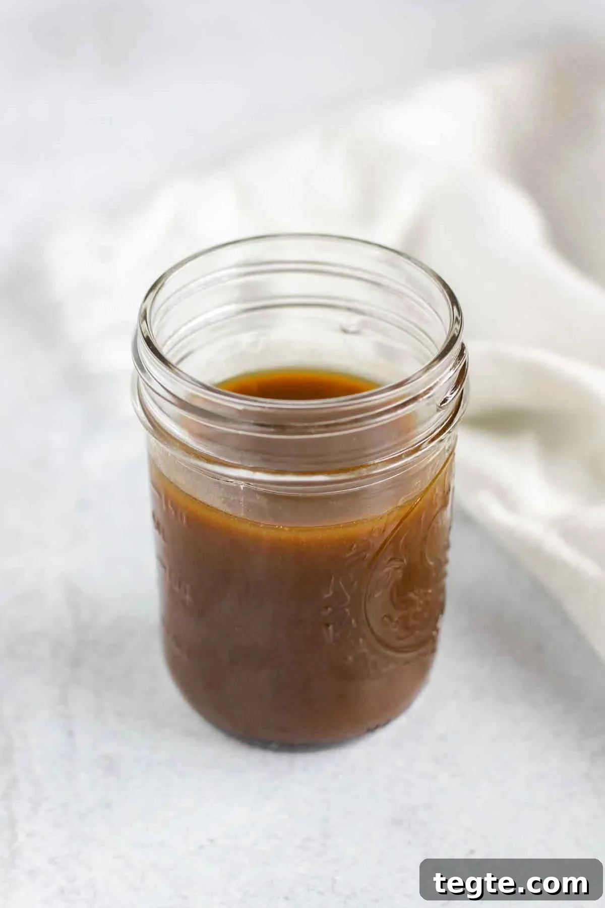 Balsamic vinaigrette dressing in a mason jar.