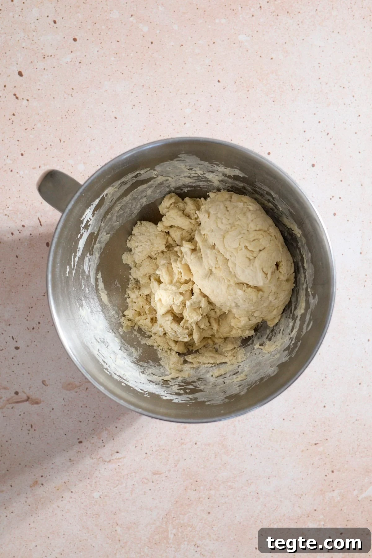 Mini Sourdough Discard Pizzas: Crispy Tiny Pizzas from Leftover Starter 4 Dough being mixd in the bowl of a stand mixer.