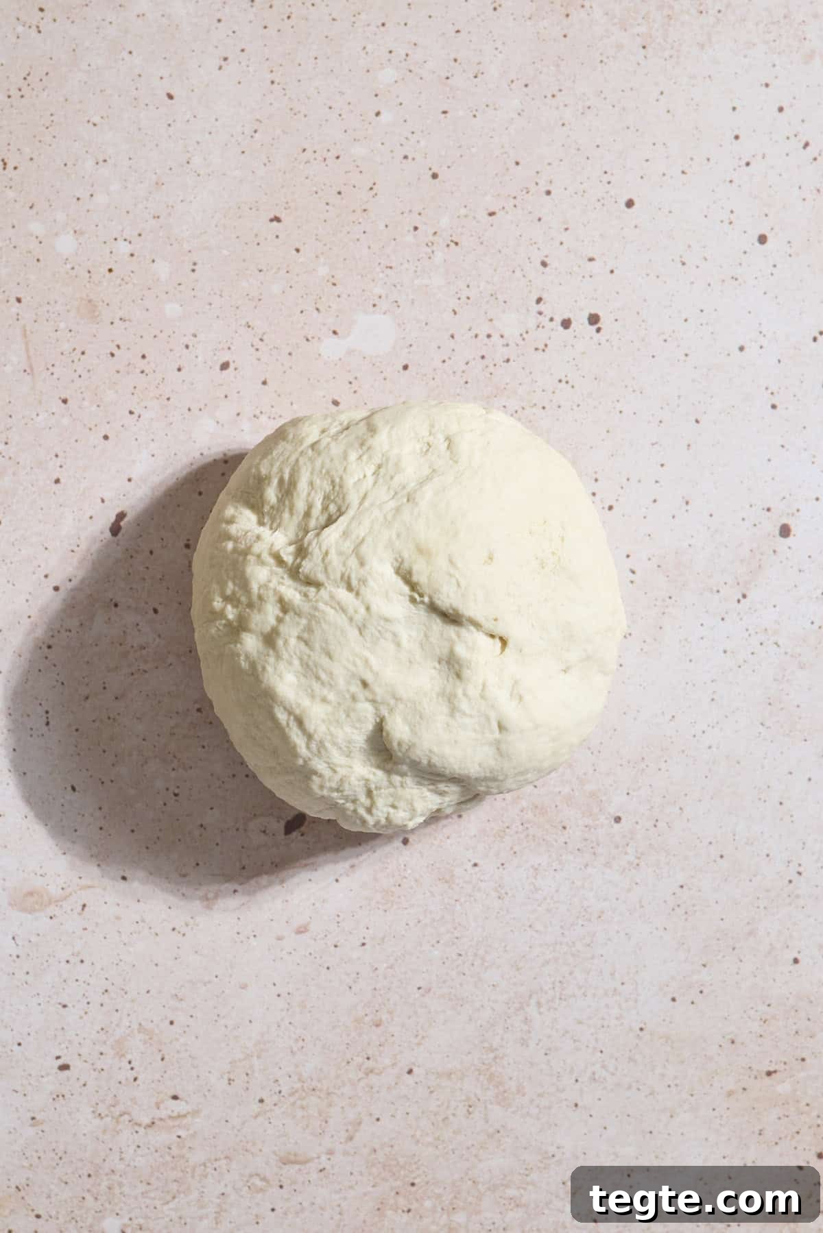 Mini Sourdough Discard Pizzas: Crispy Tiny Pizzas from Leftover Starter 5 Dough in a smooth ball after kneading.