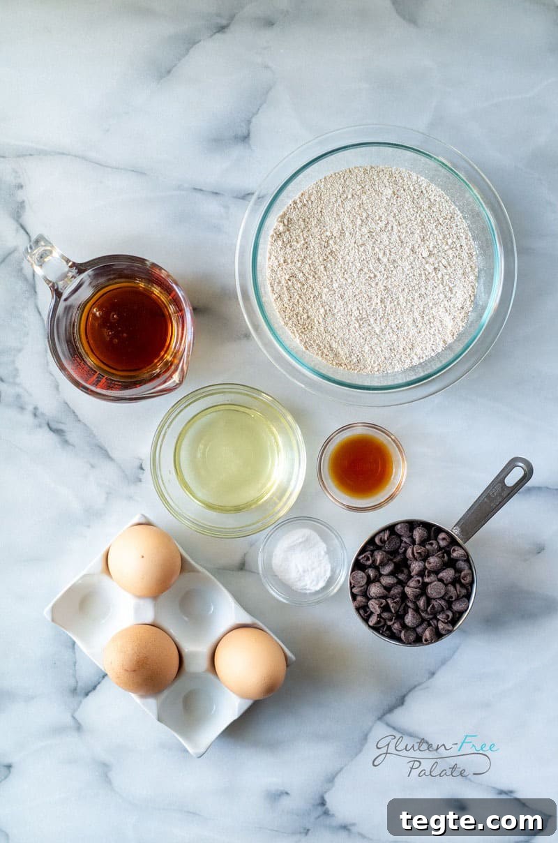 Chocolate Chip Oat Flour Muffins — Gluten-Friendly Recipe 4 top down view of the oat flour muffins ingredients.