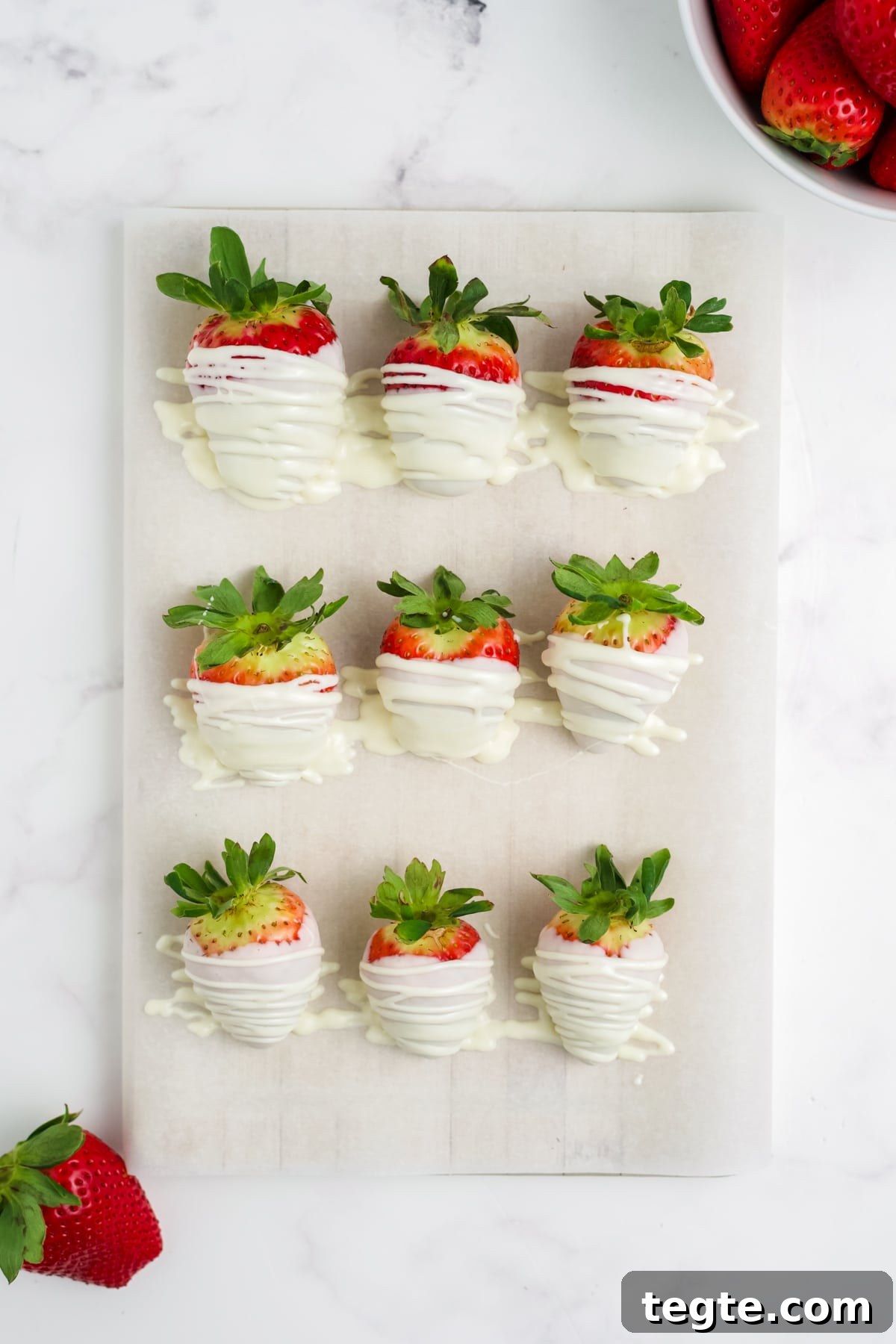 White Chocolate Dipped Strawberries You Can Make at Home 7 White chocolate covered strawberries after being drizzled with additional chocolate.