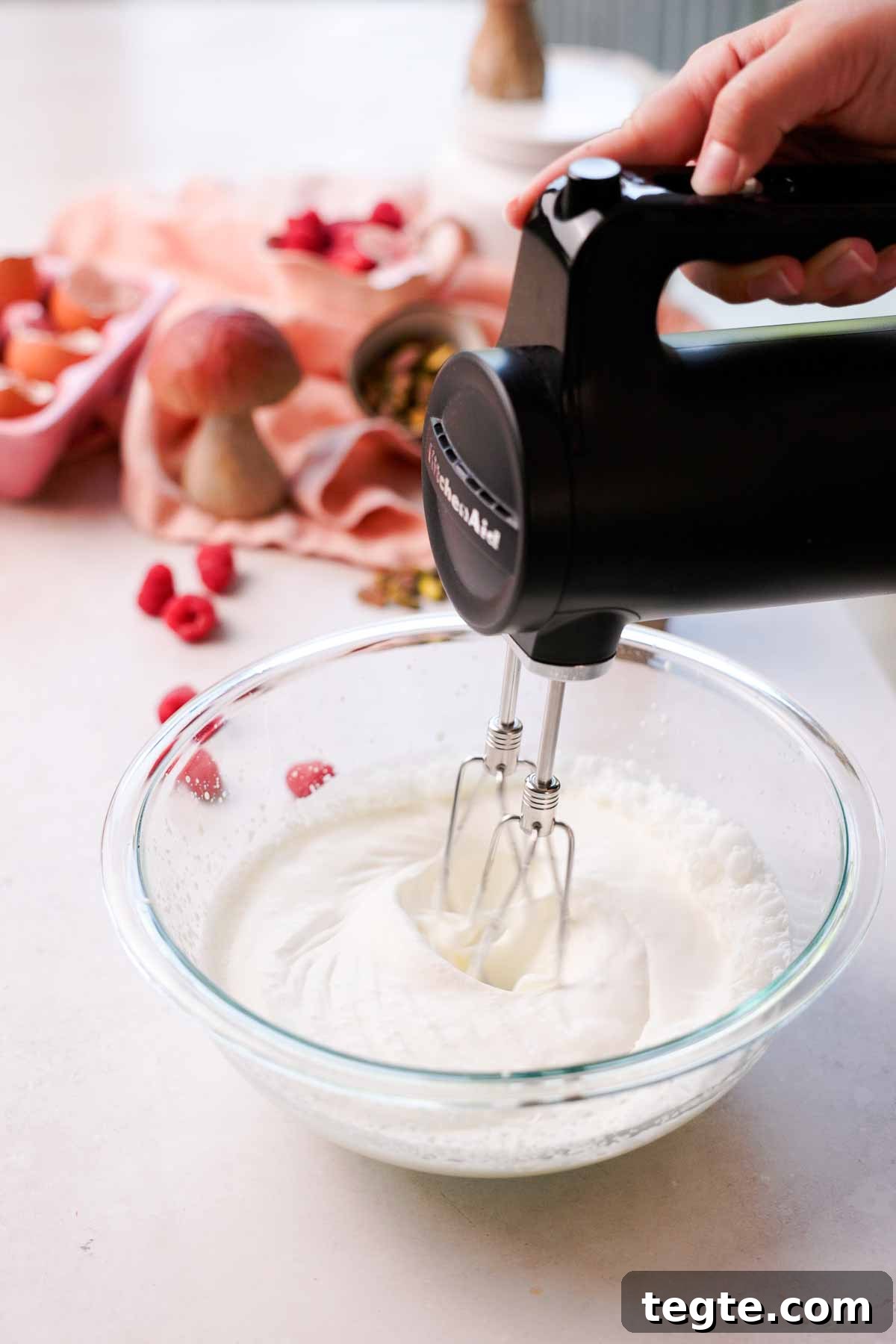 Raspberry and Pistachio Cake Roll Recipe for Spring Gatherings 11 whipping cream to medium peak with electric mixer in glass bowl