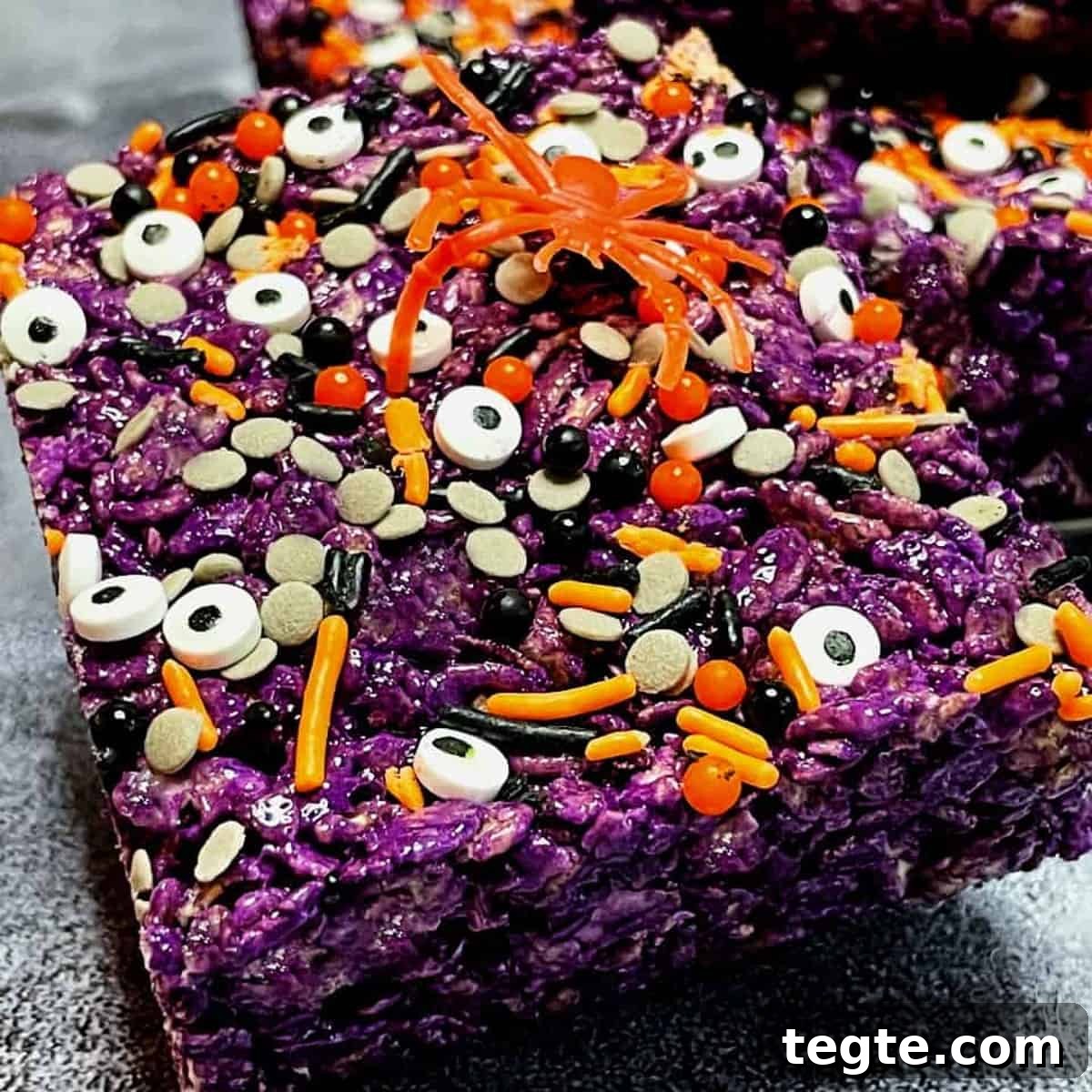 ube-halloween-rice-krispie-treat-with-a-toy-spider-on-top