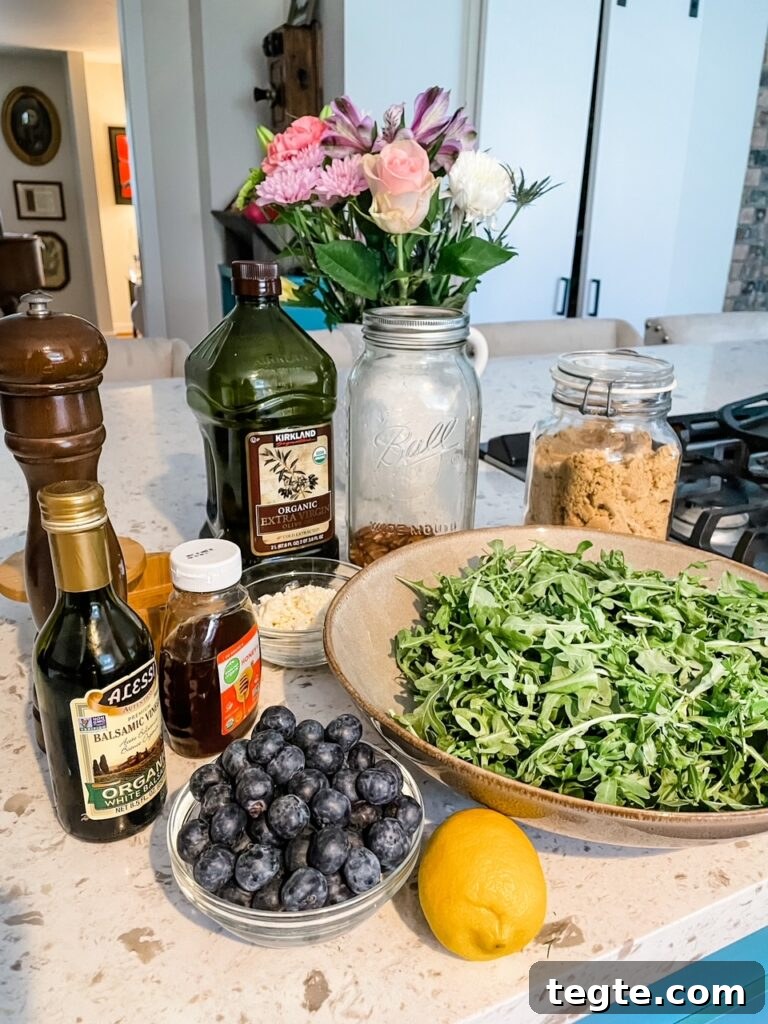 The ingredients for the salad and dressing laid out on a countertop