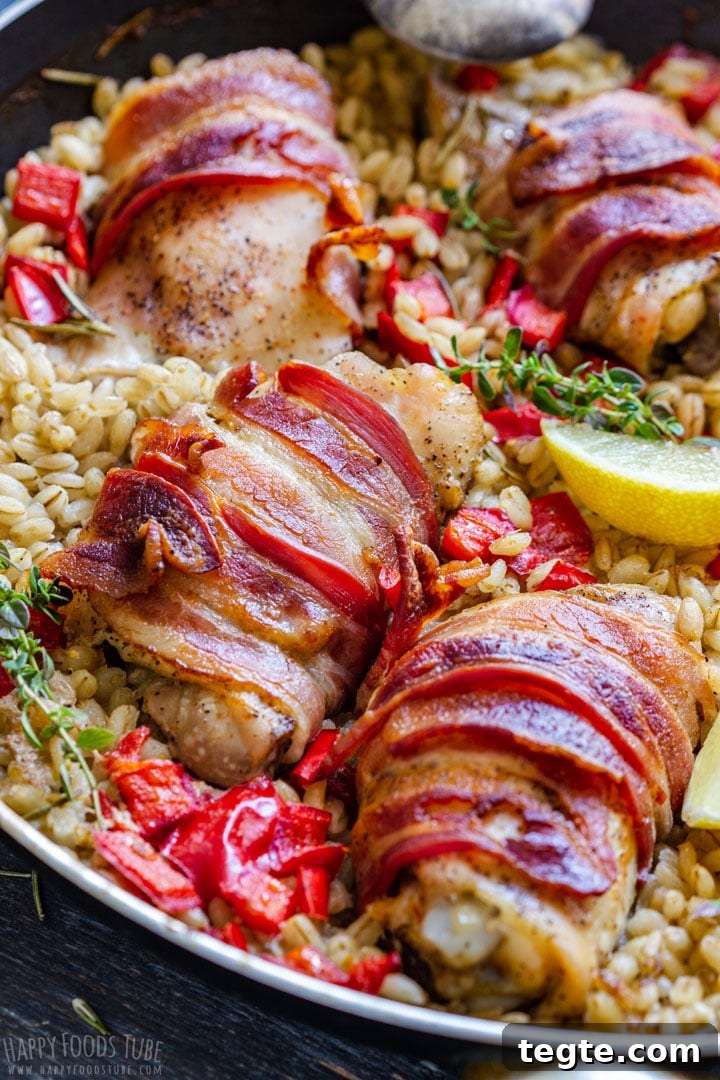 Crispy Bacon-Wrapped Chicken Thighs with Garlic Herb Glaze 8 Bacon wrapped chicken thighs with barley