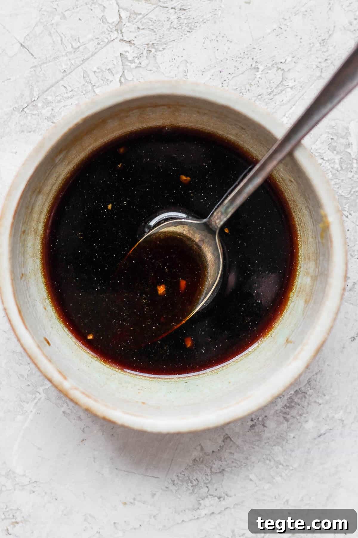 Fresh Tuna Poke Bowl Recipe: Quick Hawaiian-Style Lunch 3 Poke bowl sauce in a small bowl.