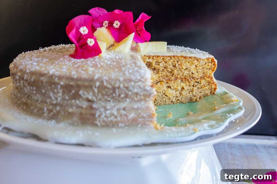30 Gluten-Free Easter Desserts Your Guests Will Crave 11 coconut pineapple cake on a cake platter, gluten free