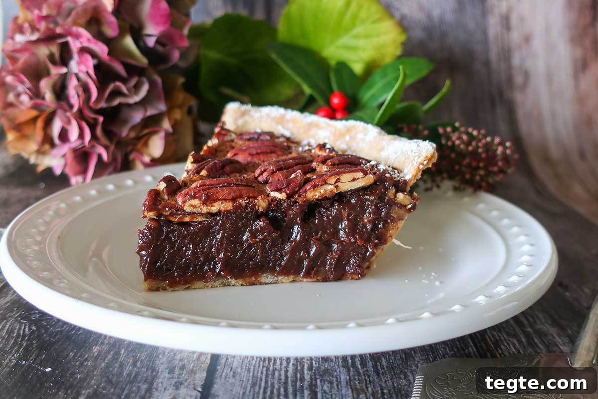 30 Gluten-Free Easter Desserts Your Guests Will Crave 18 slice of gluten free chocolate pecan pie on a plate for Easter