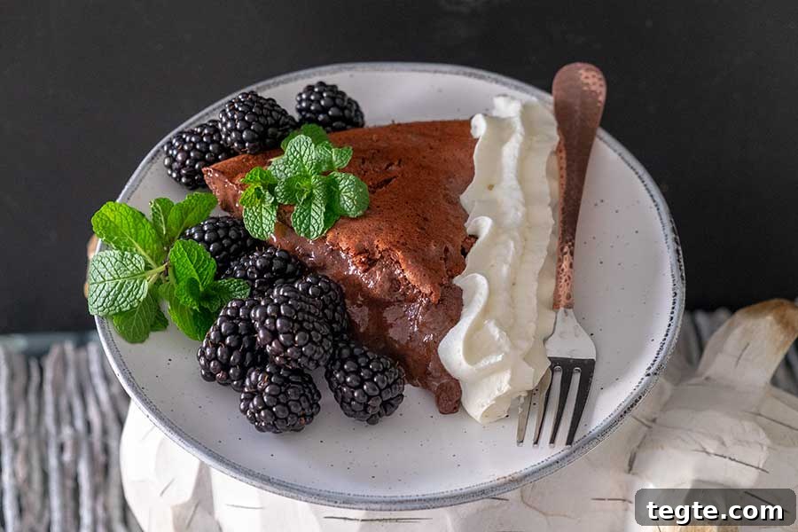 30 Gluten-Free Easter Desserts Your Guests Will Crave 24 a slice of chocolate blackberry pie on a dessert plate