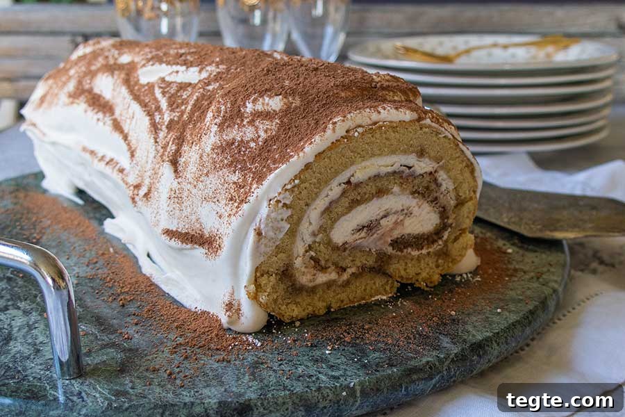 30 Gluten-Free Easter Desserts Your Guests Will Crave 27 tiramisu swiss roll on a cake platter, gluten free
