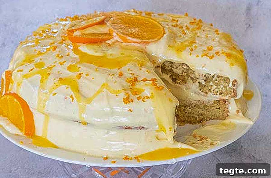 30 Gluten-Free Easter Desserts Your Guests Will Crave 28 orange cake with icing on a plate
