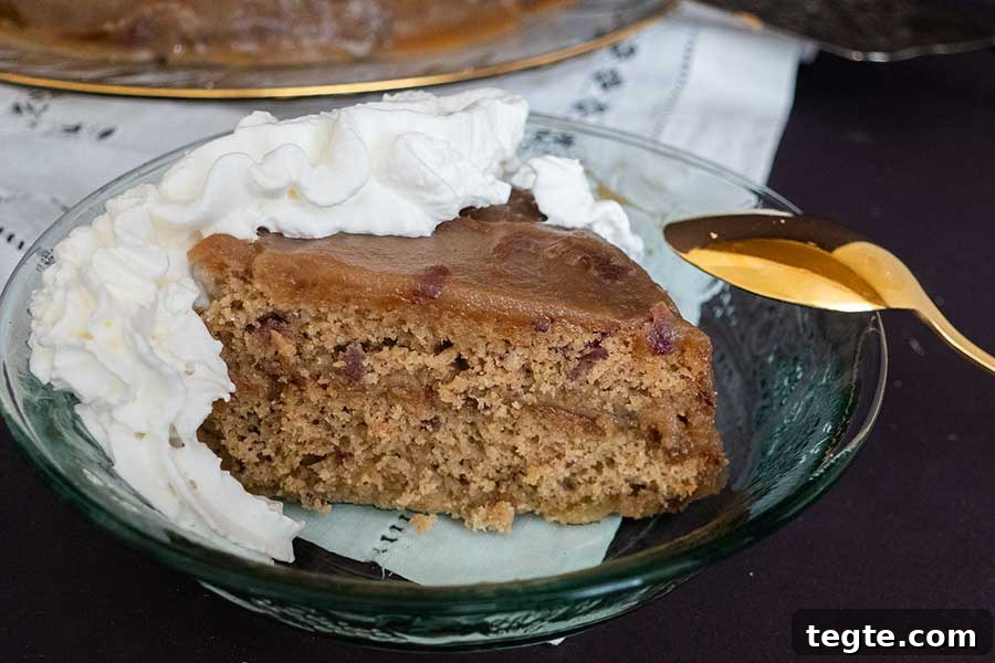 30 Gluten-Free Easter Desserts Your Guests Will Crave 6 a slice of sticky toffee pudding snacking cake with whipped cream on a plate. Easter dessert