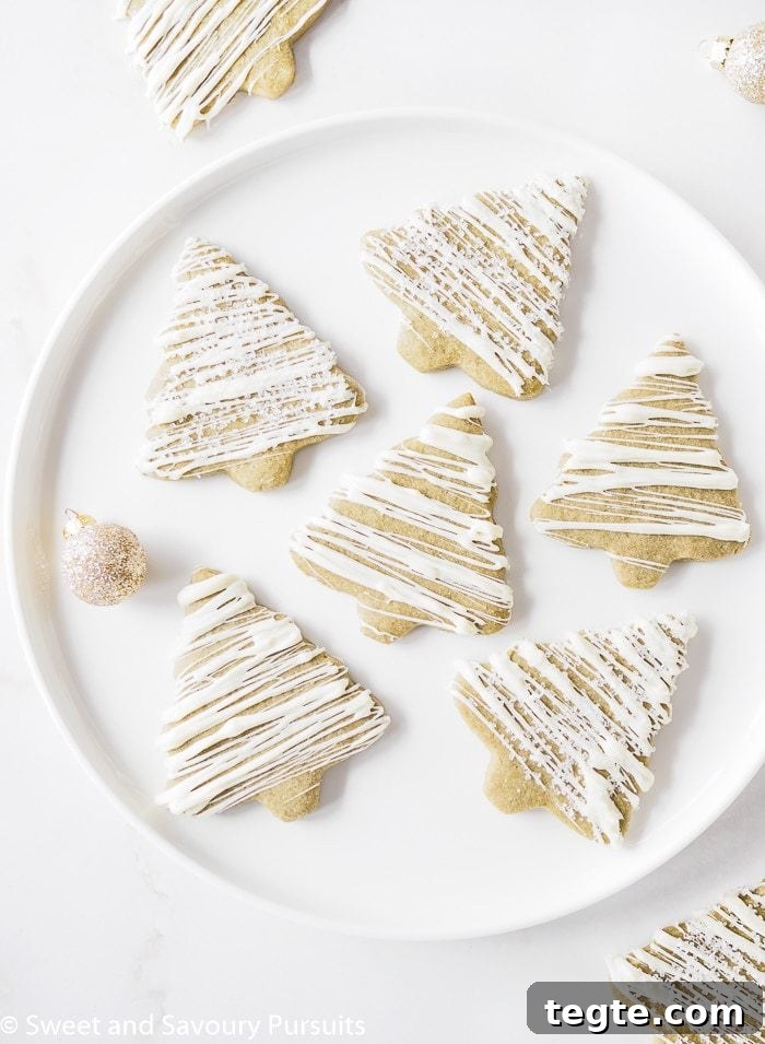 christmas tree shaped matcha green tea sugar cookies on a plate