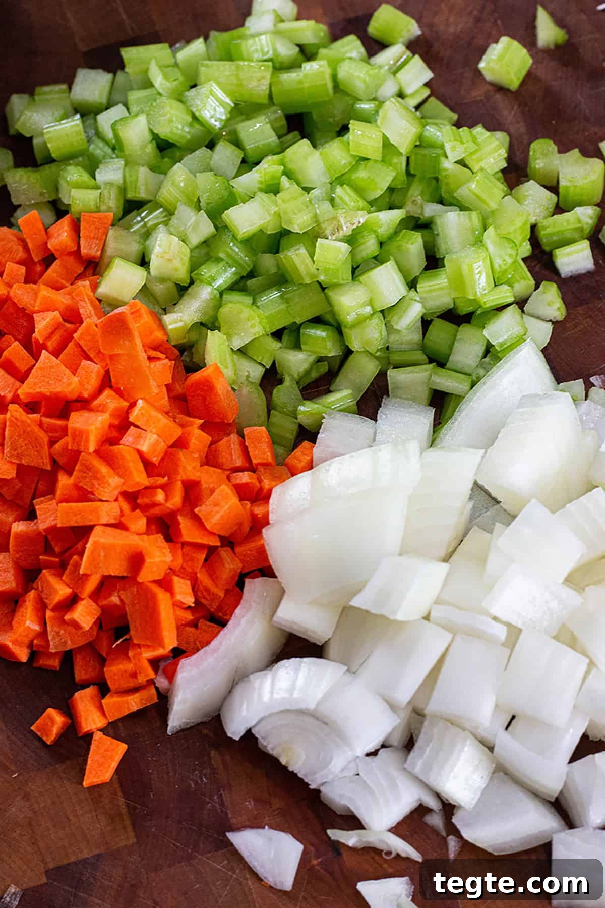 Zucchini Lasagna with Rich Bolognese Meat Sauce 3 A pile of freshly cut veggies. Carrots, Onions and celery.
