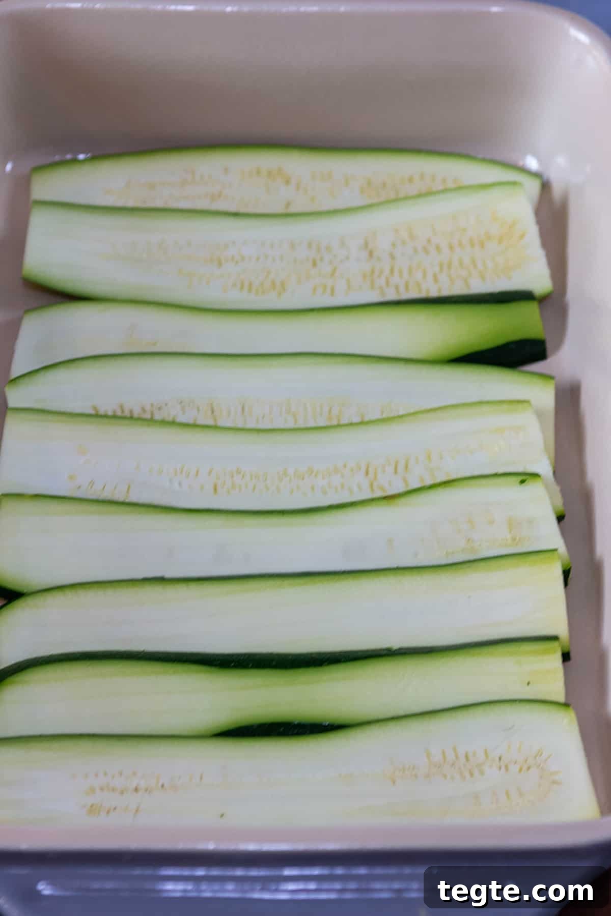 Zucchini Lasagna with Rich Bolognese Meat Sauce 5 Zucchini noodles layered in a dish