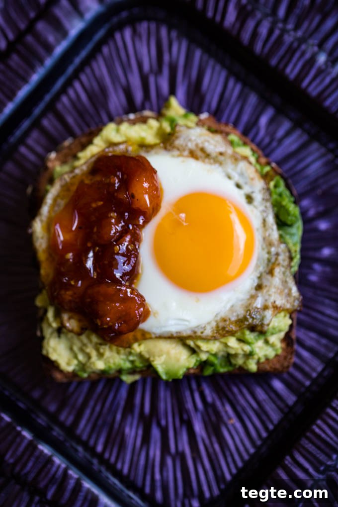 Poached Egg on Avocado Toast with Sweet Tomato Jam 4 Egg on Avocado Toast with Tomato Jam