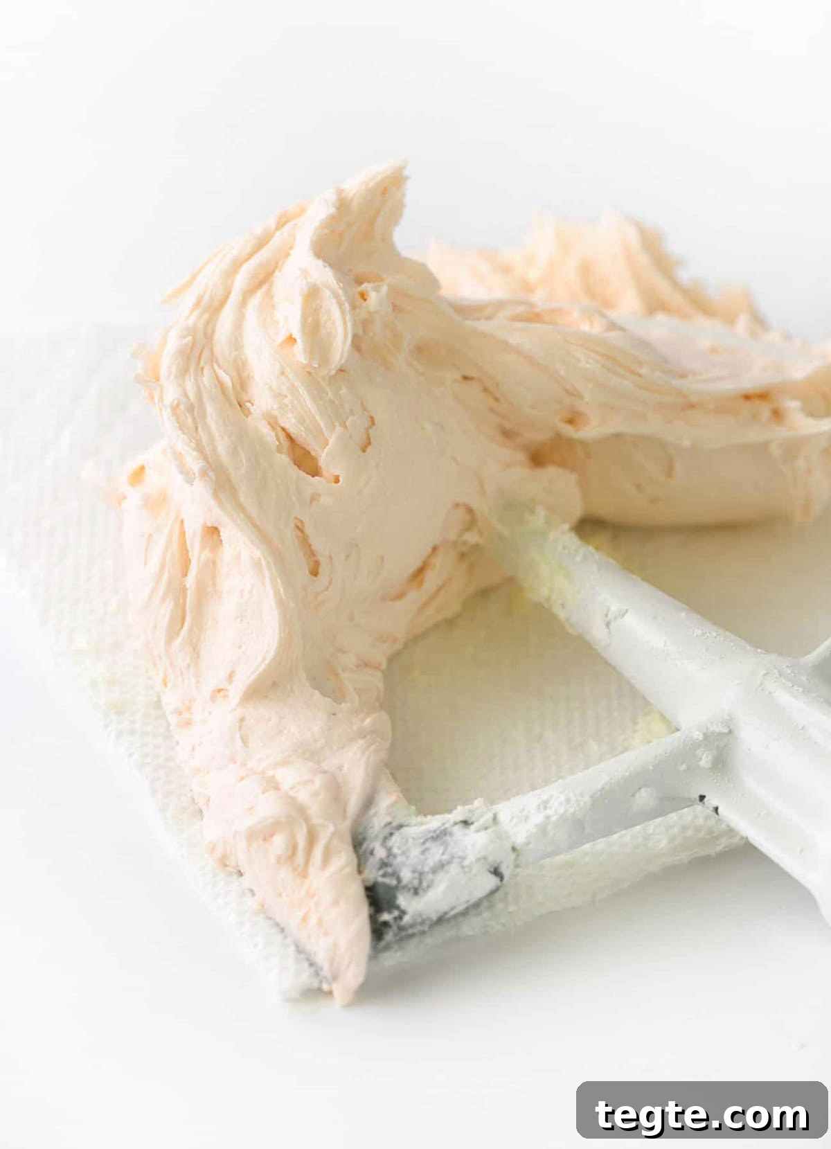 Orange buttercream frosting for sugar cookies