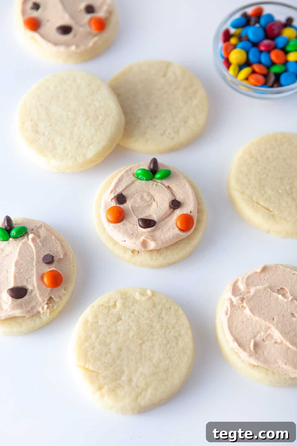 Easy Halloween Pumpkin Cookies using cut out sugar cookies and mini M&M's