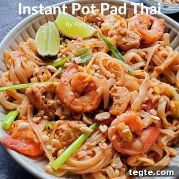 Instant Pot Thai Peanut Chicken Recipe That Melts in Minutes 16 Instant Pot Pad Thai with chicken & shrimp being lifted with a tong