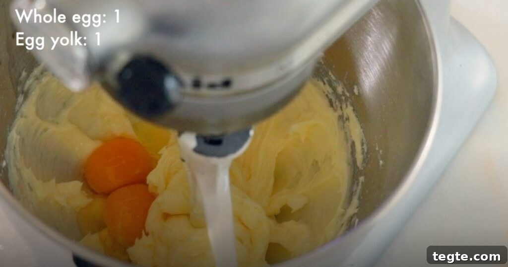 Classic Homemade Icebox Cookies Recipe for Perfect Slices 6 adding eggs in butter to make cookie dough