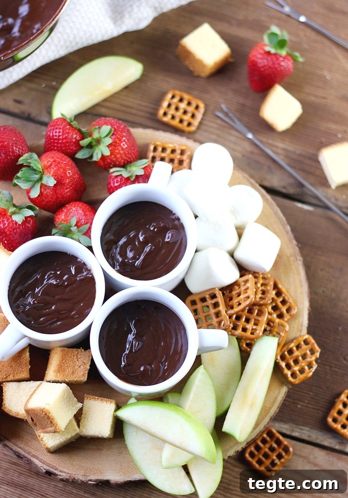 Chocolate Caramel Fondue Recipe for Dipping Fruits and Treats 6 This Chocolate Caramel Fondue Recipe is a decadent dessert the whole family will enjoy! It's easy to make anytime!