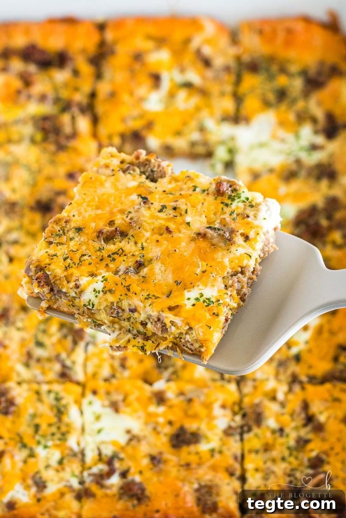 Cheesy Breakfast Sausage Casserole with Crispy Hash Browns 2 The best Breakfast Sausage Casserole with a layer of cheese, eggs, crescent dough, and sausage!