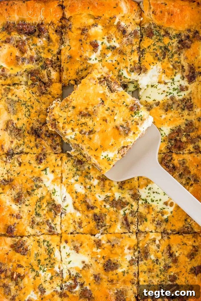 Cheesy Breakfast Sausage Casserole with Crispy Hash Browns 8 The best Breakfast Sausage Casserole with a layer of cheese, eggs, crescent dough, and sausage!