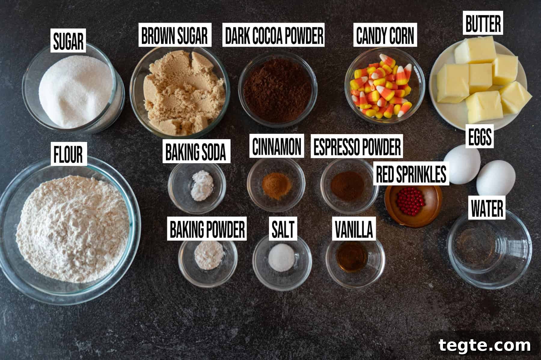 Black Cat Cookie Recipe: Soft Chocolate Drops for Halloween 3 Black Cat Sugar Cookies ingredients in individual bowls and labeled.