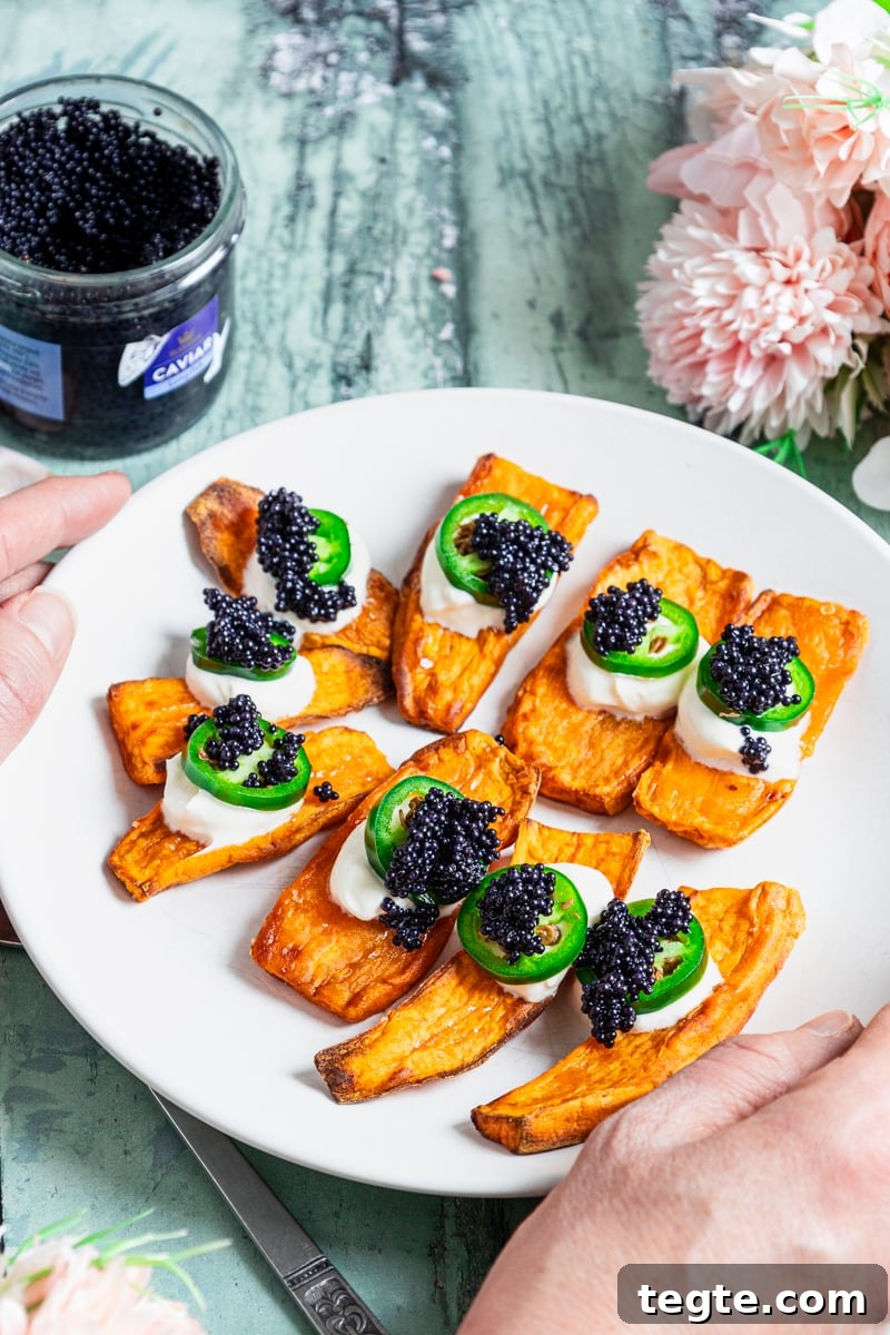 Crispy Air Fryer Sweet Potato Canapés Topped with Caviar 4 Plate of sweet potato canapes