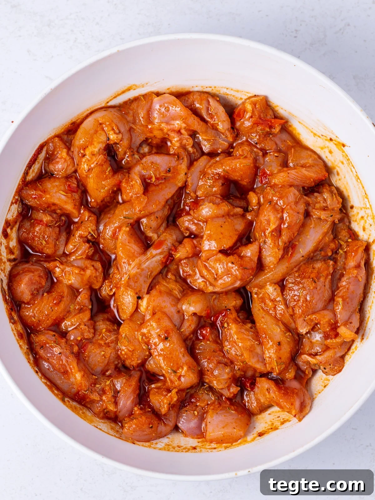Honey Harissa Chicken Rice Bowls with Roasted Veggies 5 bowl of marinated chicken