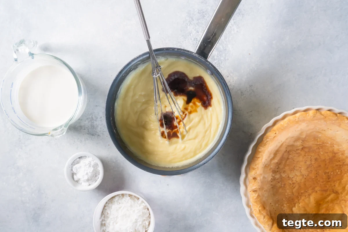 whisking vanilla into the filling