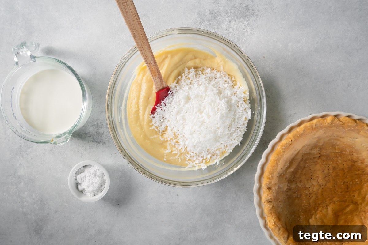 mixing coconut into pie filling