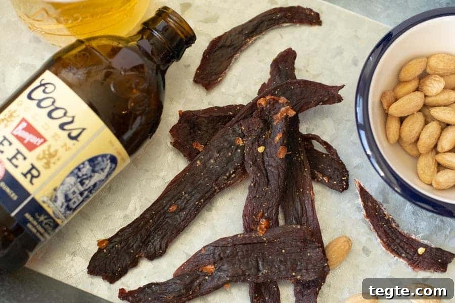 Drunken Spiced Venison Jerky Recipe 13 Deer jerky finished with beer in background