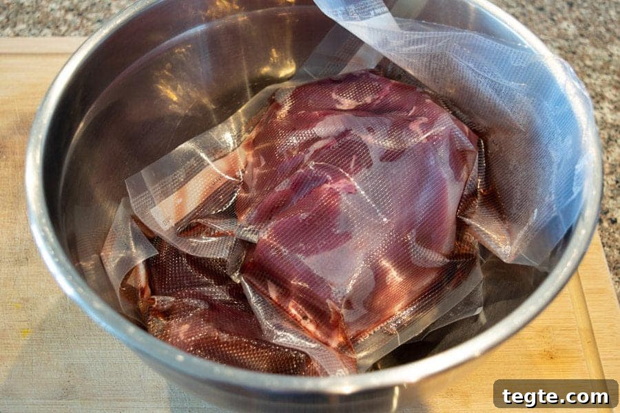 Drunken Spiced Venison Jerky Recipe 3 Thawed freezer packed venison in bowl