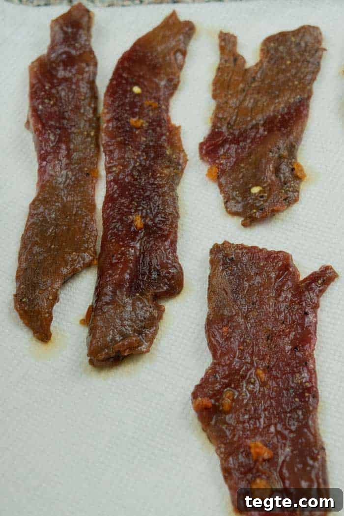 Drunken Spiced Venison Jerky Recipe 10 Habanero deer jerky drying on paper towels