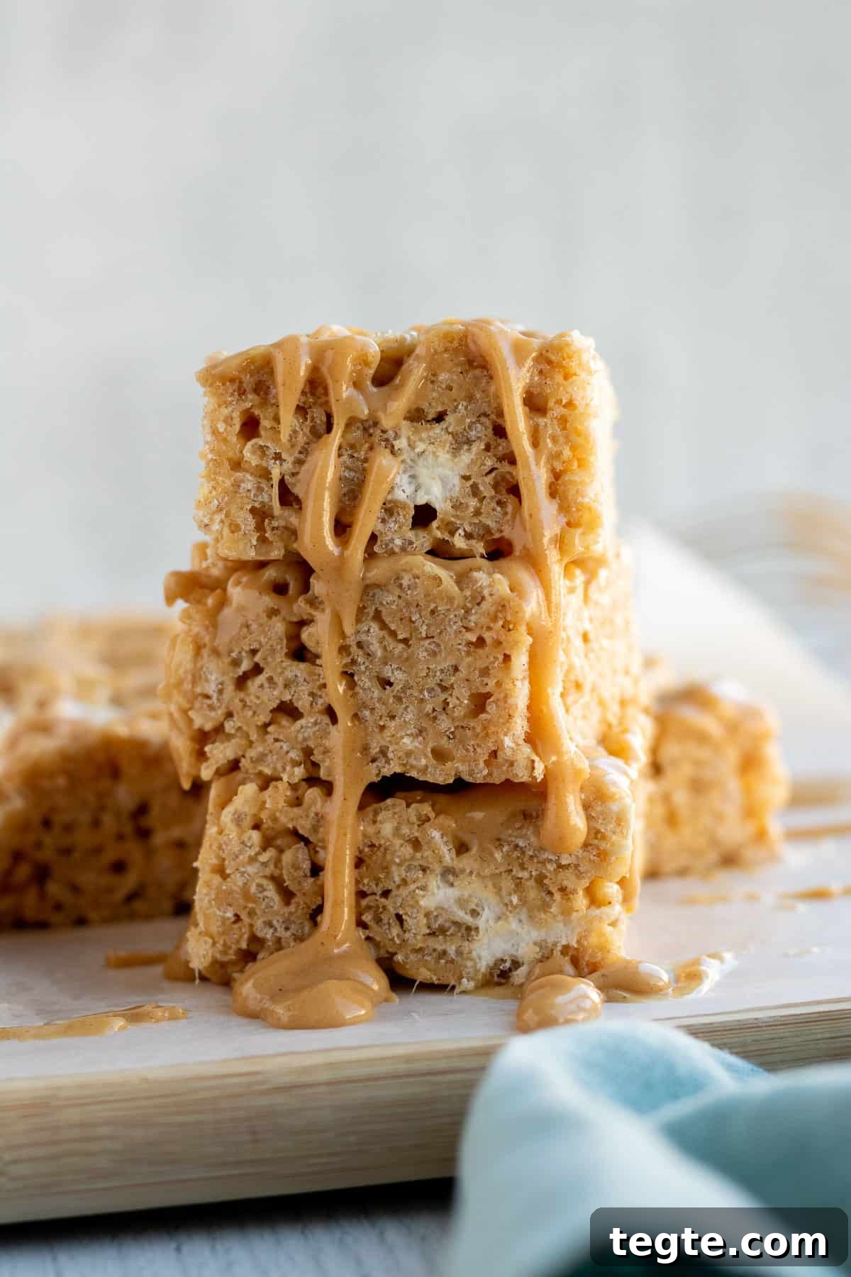 Peanut Butter Rice Krispie Bars Recipe — Crispy No-Bake Treat 3 stack of peanut butter rice krispie bars
