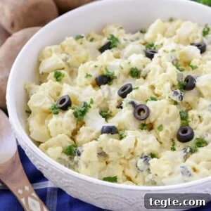 Classic Creamy Potato Salad Recipe for Picnics and BBQs 4 A best potato salad recipe topped with sliced olives.
